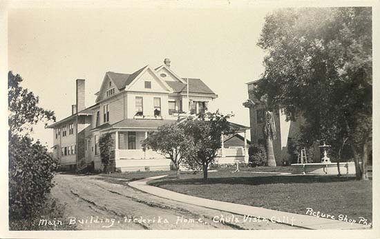 Main building, Fredericka Home — The main house of the Fredericka Home for the aged, the retirement community that grew into today's Fredericka Manor, seen from an unpaved lane.