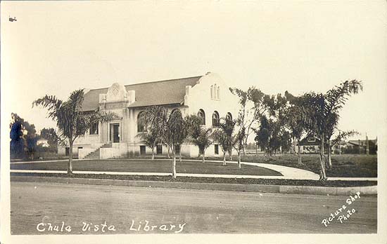Chula Vista Library — The town's first purpose-built library, a Mission Revival block sitting almost alone on a dirt-edged street with open fields behind it.